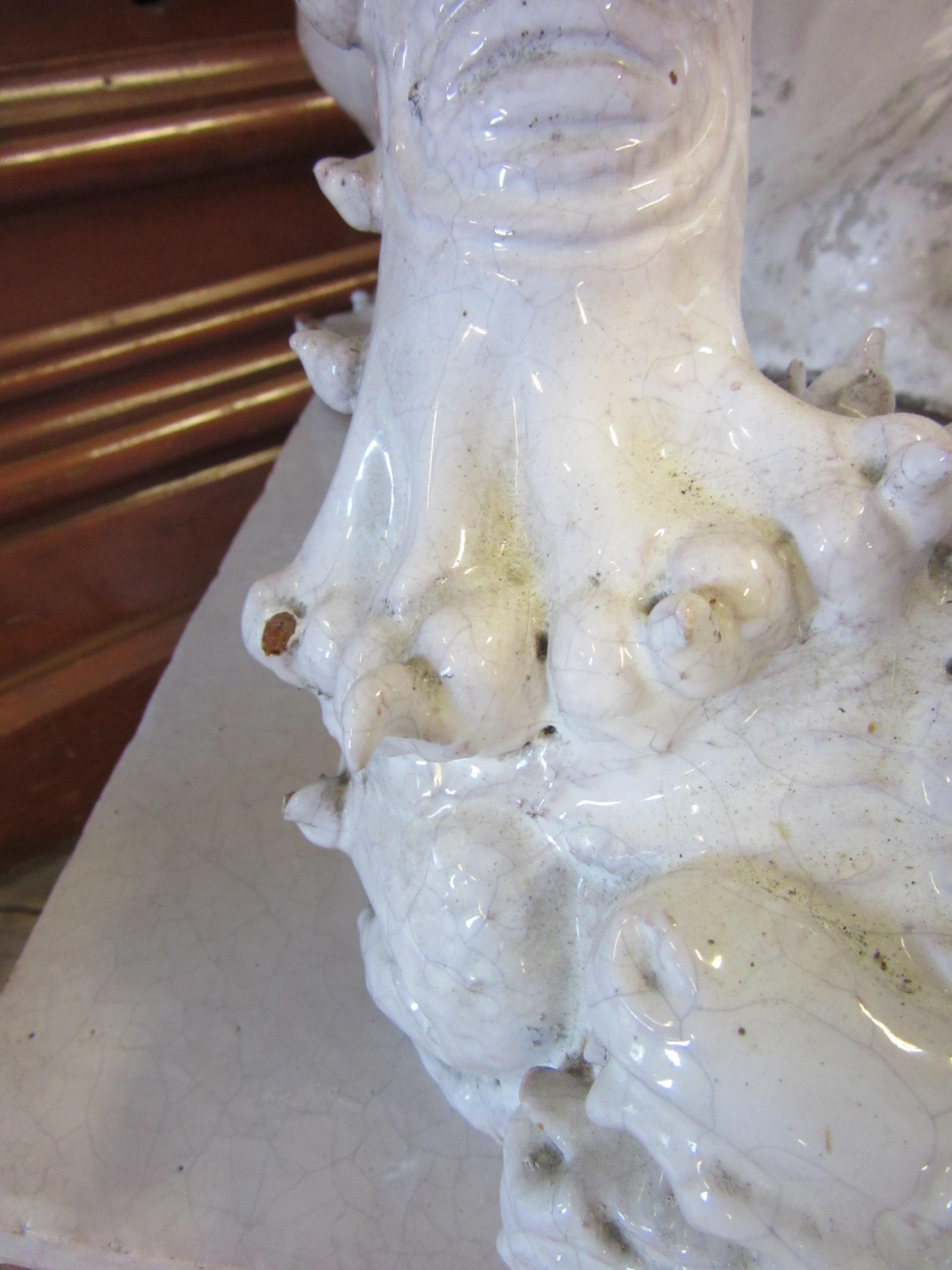 A LARGE PAIR OF WHITE CRACKLE GLAZED TERRACOTTA TEMPLE LIONS Image