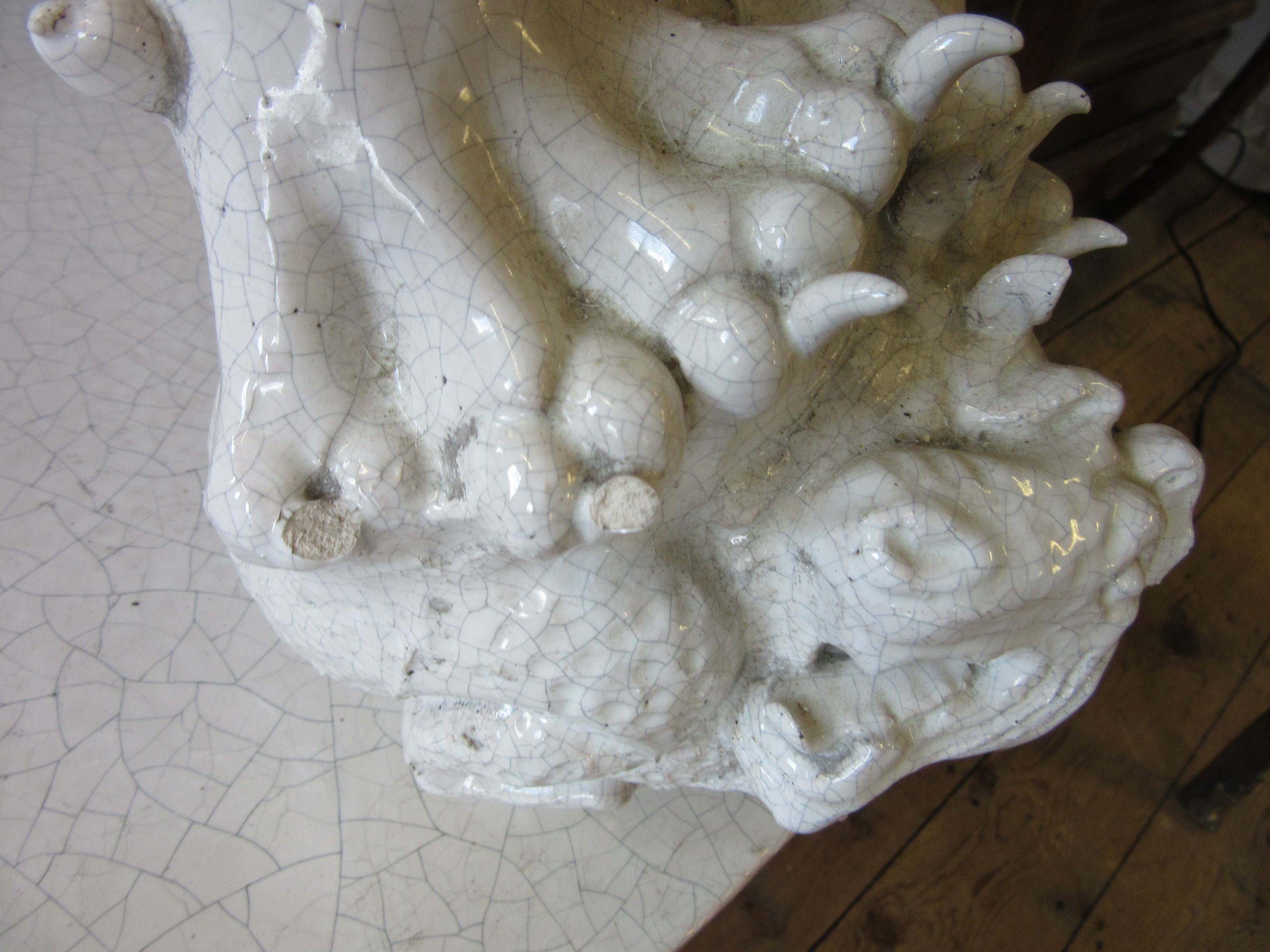 A LARGE PAIR OF WHITE CRACKLE GLAZED TERRACOTTA TEMPLE LIONS Image