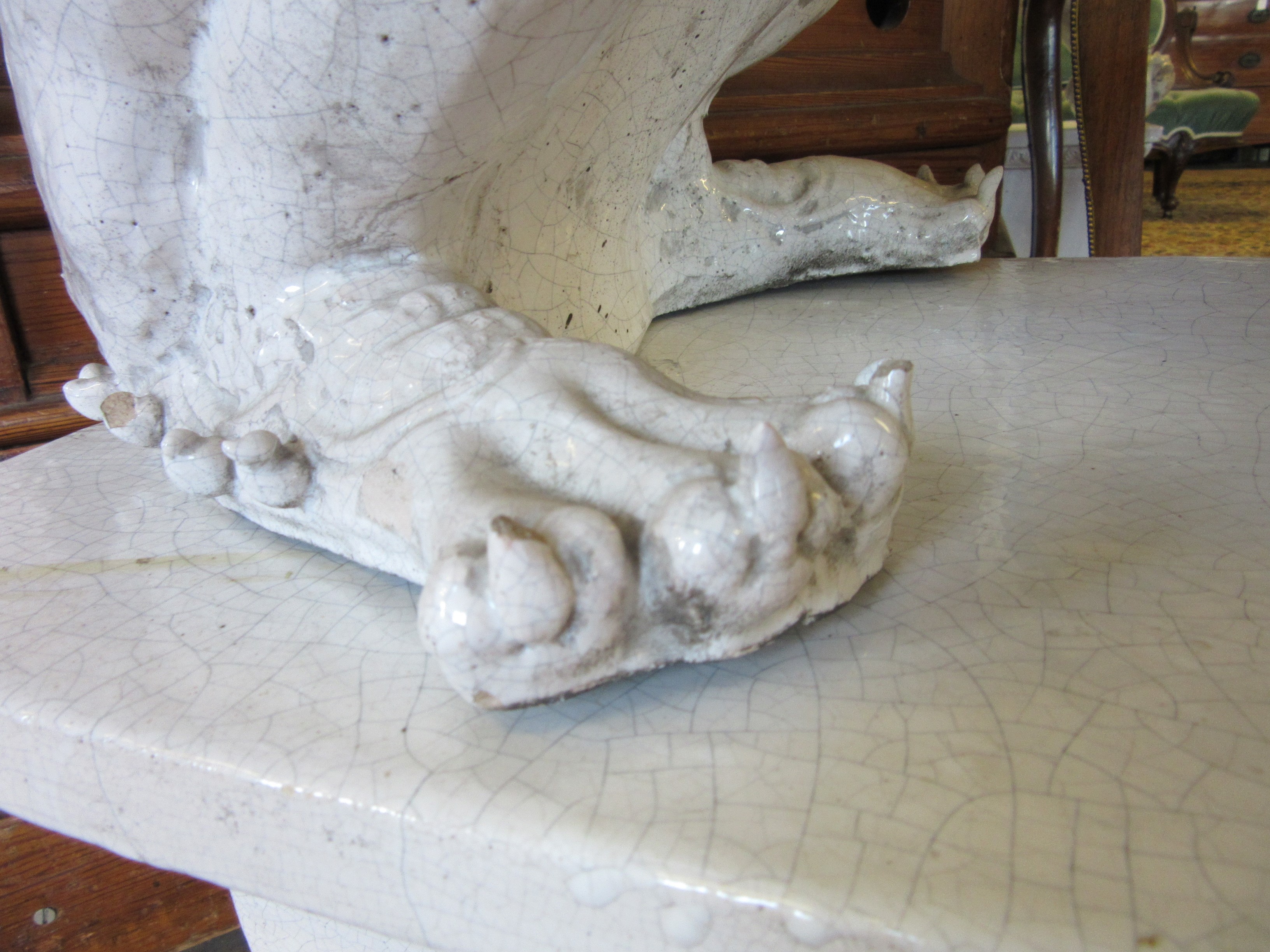 A LARGE PAIR OF WHITE CRACKLE GLAZED TERRACOTTA TEMPLE LIONS Image