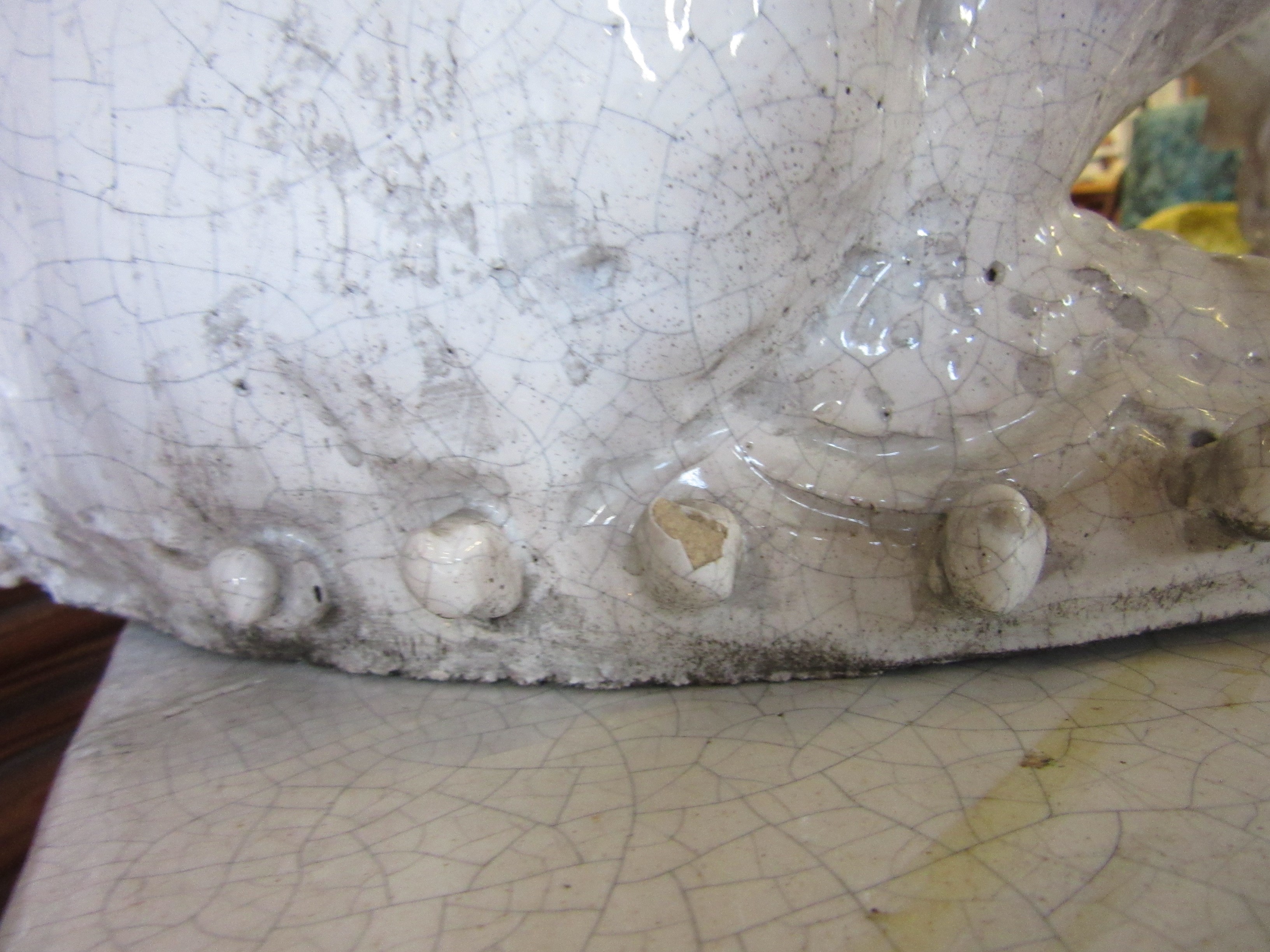 A LARGE PAIR OF WHITE CRACKLE GLAZED TERRACOTTA TEMPLE LIONS Image