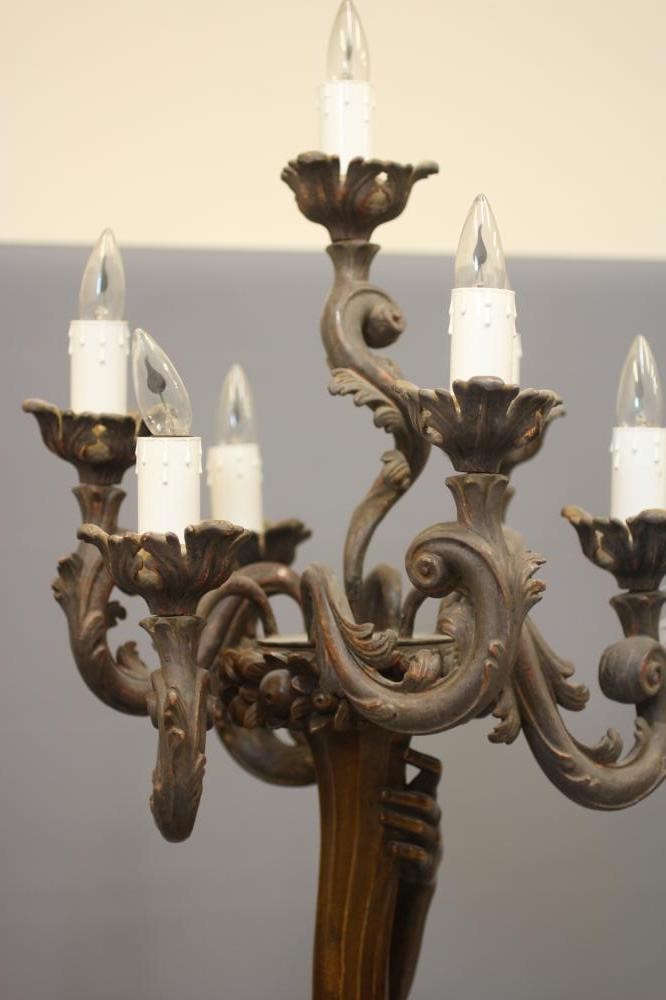 A PAIR OF CARVED WOOD CANDELABRA FIGURES OF BLACKAMOORS Image