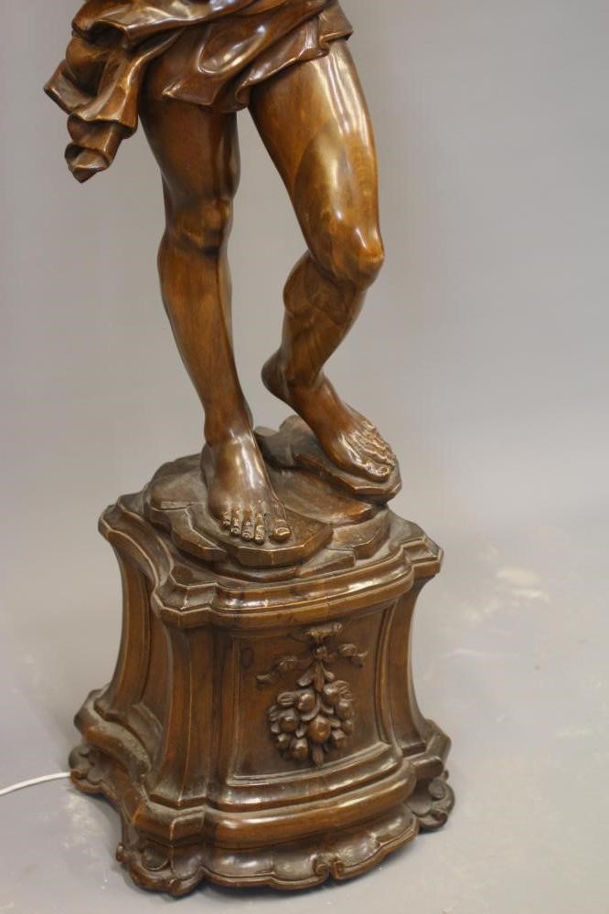 A PAIR OF CARVED WOOD CANDELABRA FIGURES OF BLACKAMOORS Image