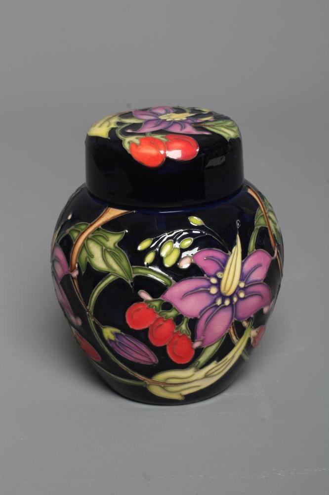 A MOORCROFT POTTERY SOLANUM RHS JAR AND COVER, 2019, designed by Nicola Slaney, 14 of a Ltd. Ed. of Image