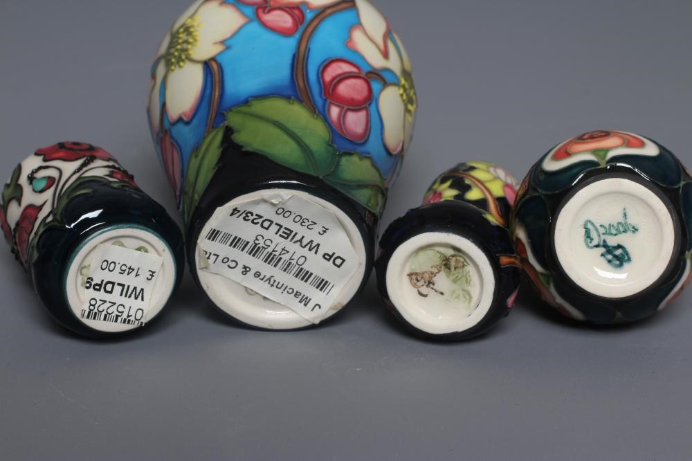 THREE MOORCROFT POTTERY MINIATURE VASES comprising a Wild Poppy Dance waisted cylindrical vase Image