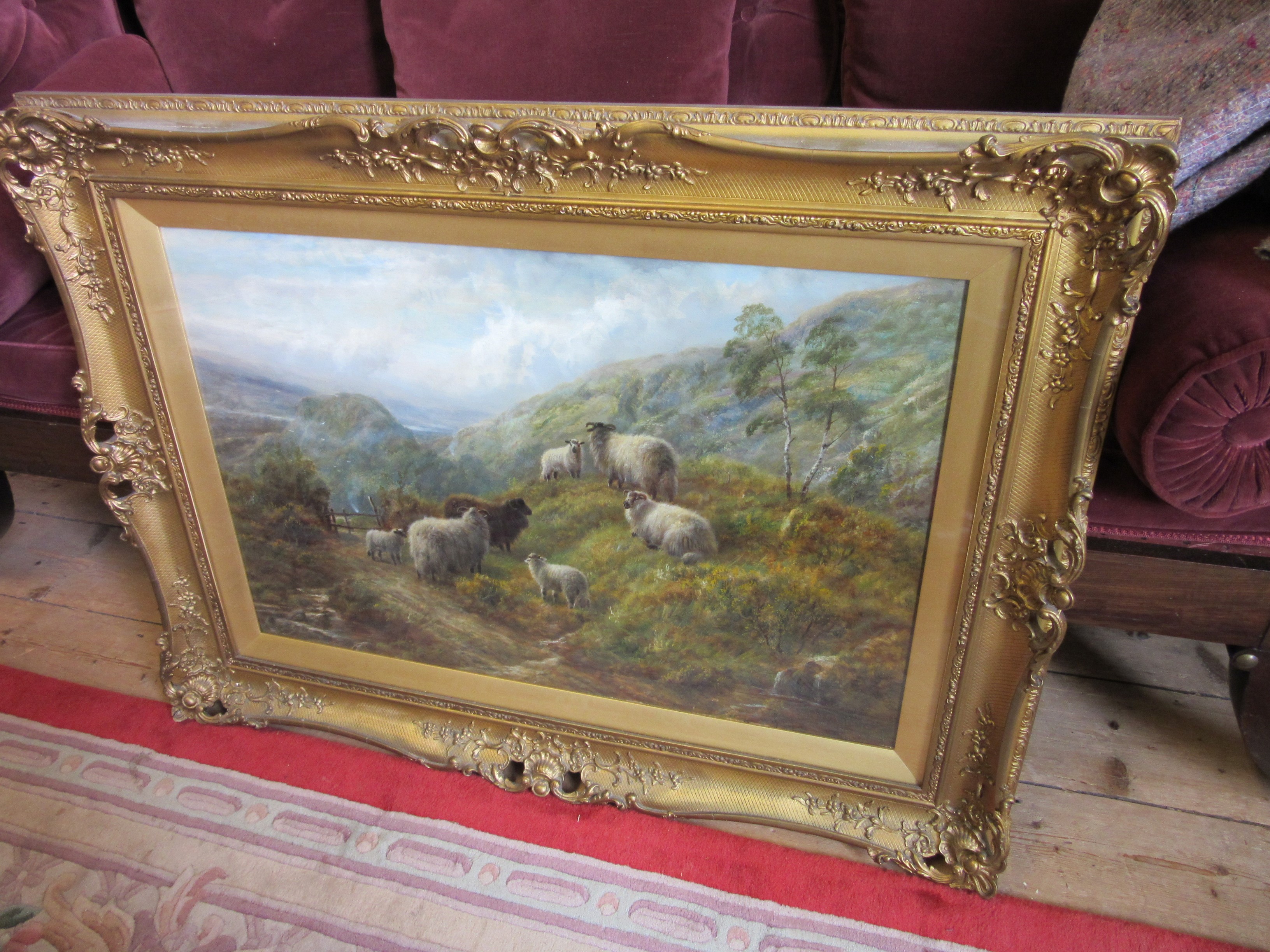 WILLIAM WATSON JNR (1847-1921) Highland Cattle in a Rugged Landscape and Sheep beside a Highland Image