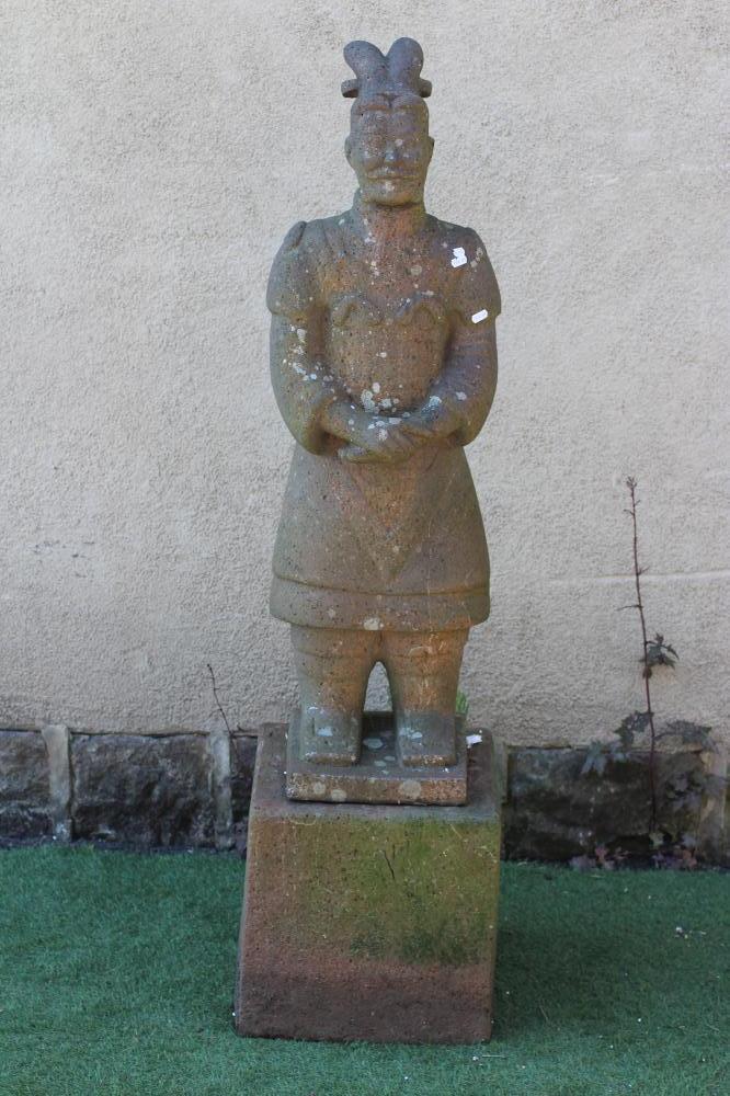 A CHINESE TERRACOTTA QIN DYNASTY STYLE WARRIOR, modern, raised on a square plinth, 14" w x 56 1/4" h Image