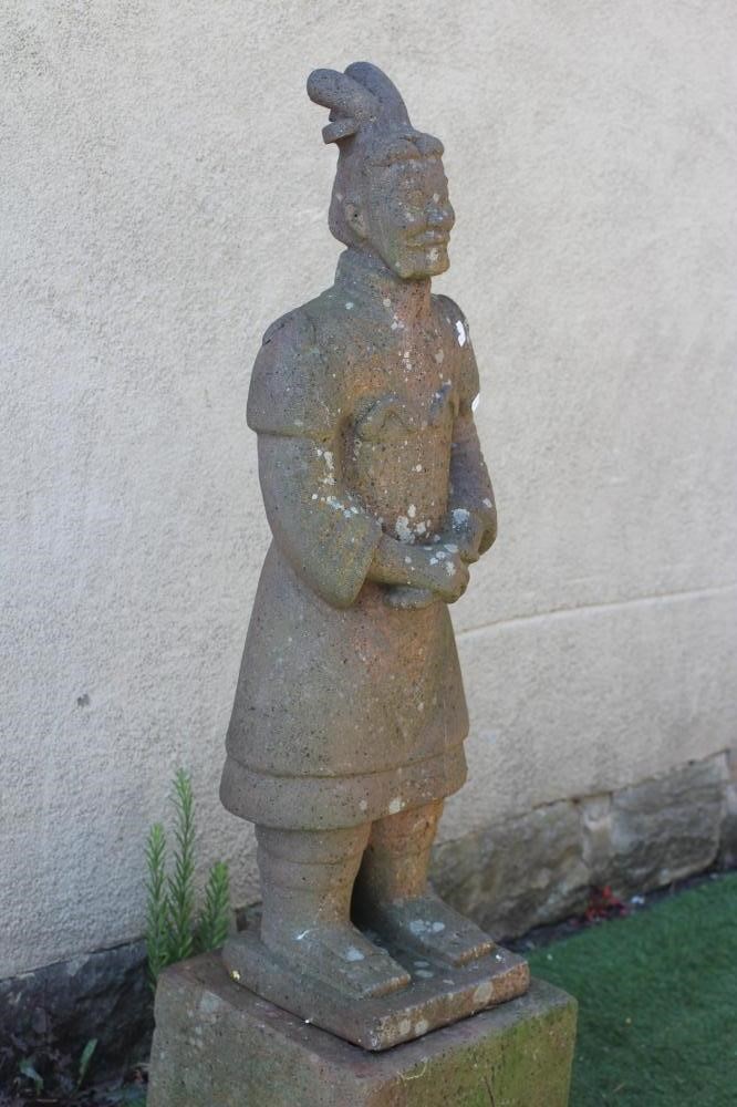 A CHINESE TERRACOTTA QIN DYNASTY STYLE WARRIOR, modern, raised on a square plinth, 14" w x 56 1/4" h Image