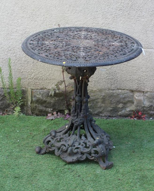 A VICTORIAN CAST IRON CONSERVATORY TABLE in the rococo revival style Image