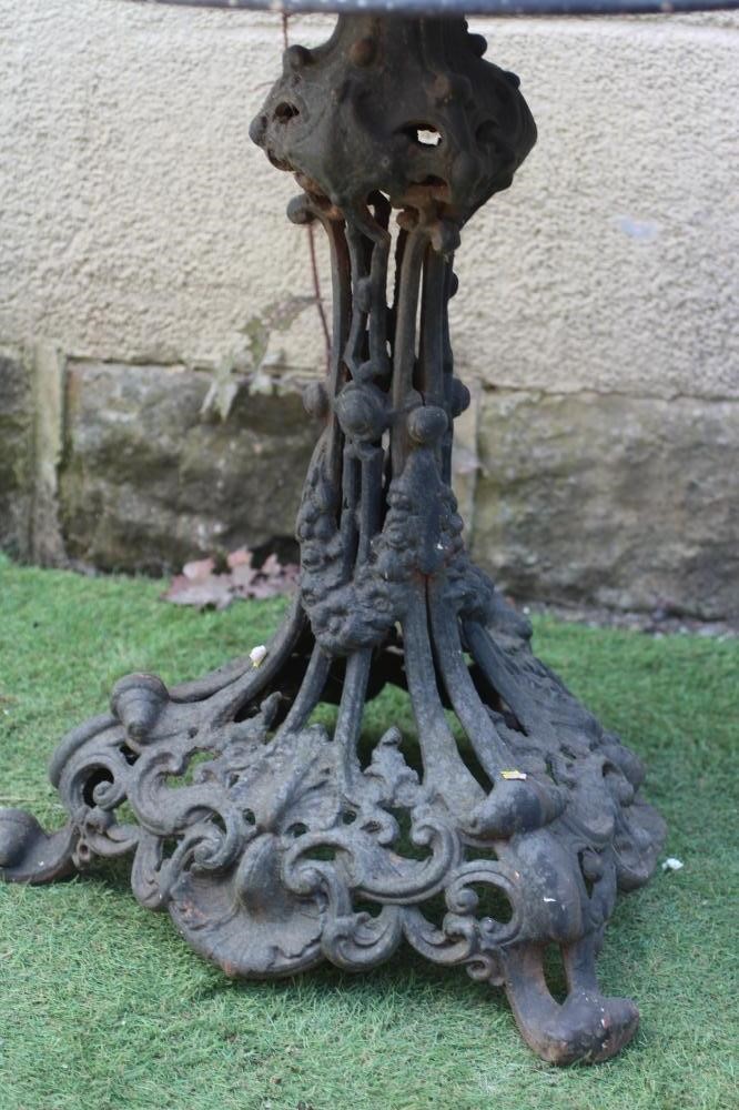 A VICTORIAN CAST IRON CONSERVATORY TABLE in the rococo revival style Image