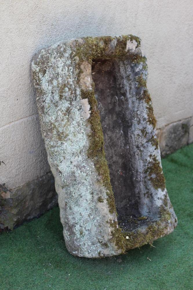 A SANDSTONE TROUGH of rough-hewn oblong form, 36 1/2" w x 18" d x 10 1/2" h (Est. plus 24% premium Image