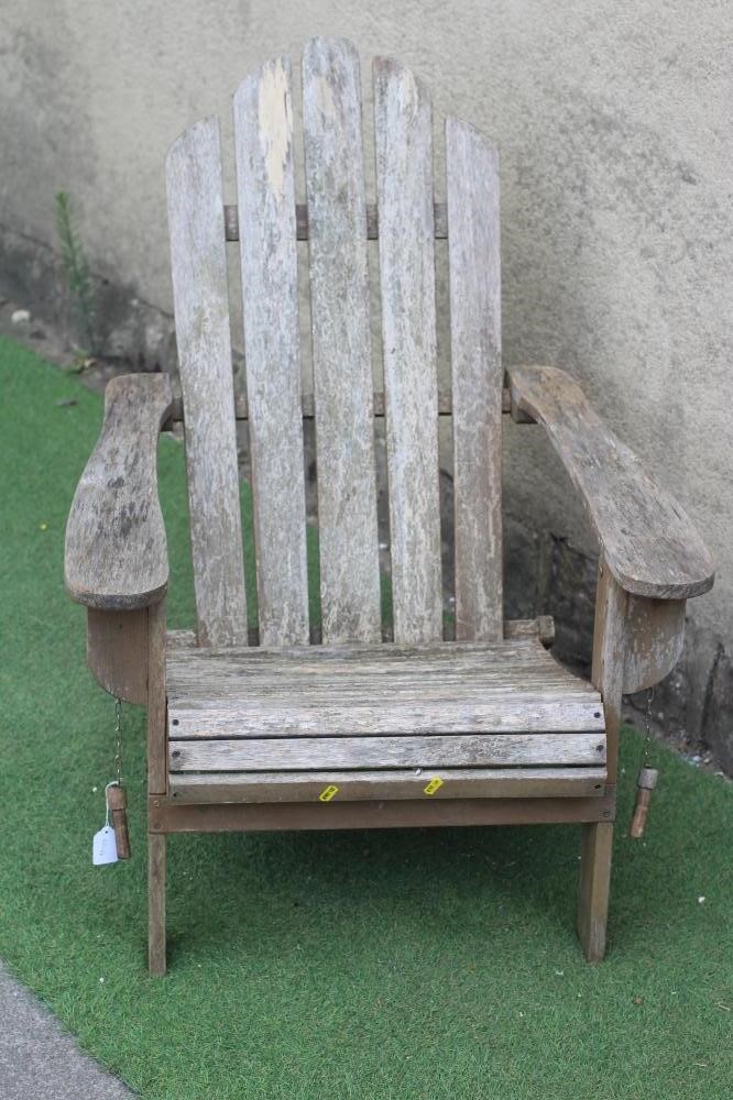 AN ADIRONDACK FOLDING HARDWOOD CHAIR, 28 3/4" w x 19" d x 37 1/4" h (Est. plus 24% premium inc. VAT) Image