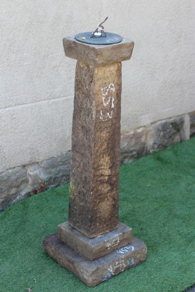 A SANDSTONE SUNDIAL of square form with stepped plinth and bronze gnomen, 13" w x 42 1/2" h (Est. Image