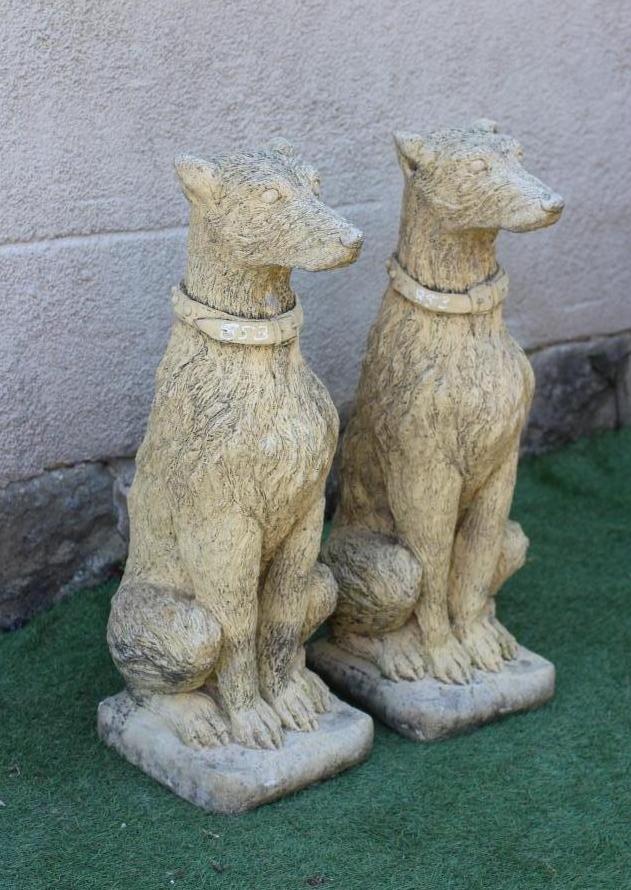 A PAIR OF CAST STONE LURCHER TYPE DOGS modelled seated, with alert expression and wearing a collar, Image