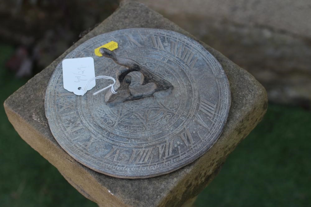 A SANDSTONE SUNDIAL, comprising a Victorian carved baluster on square base with a later lead gnomen, Image