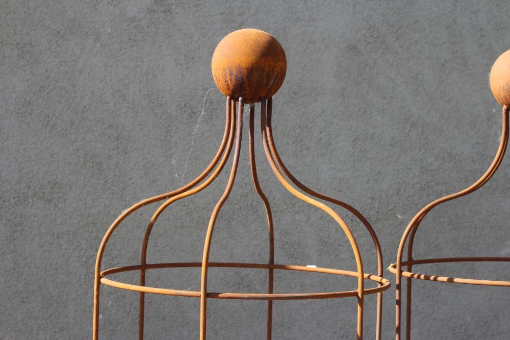 A PAIR OF WROUGHT IRON "WINDSOR PATTERN" CYLINDRICAL PLANT OBELISKS, the top of curved outline with Image