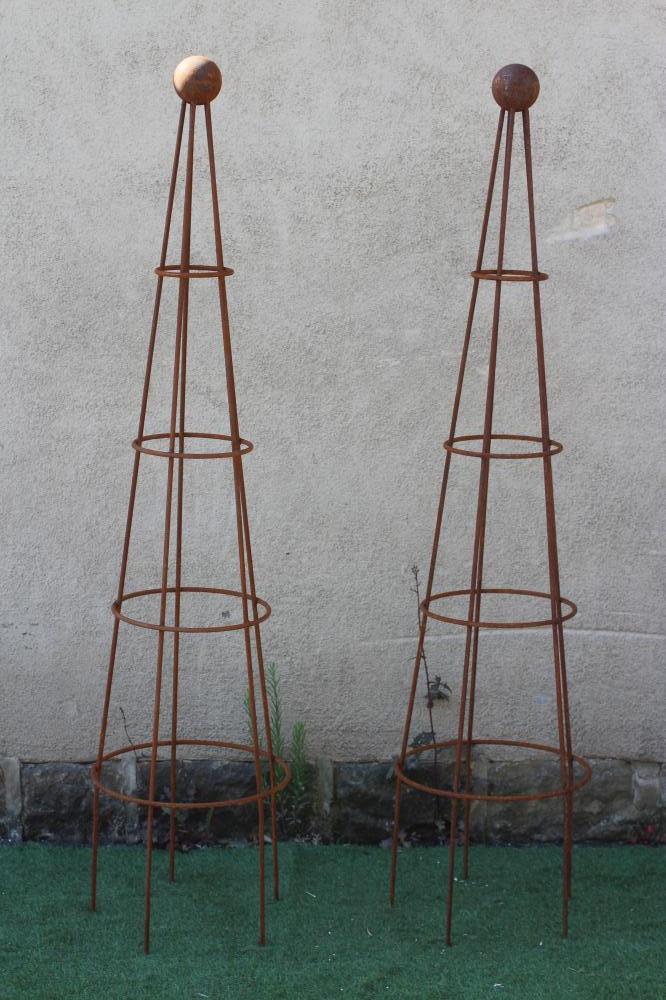A PAIR OF WROUGHT IRON CONICAL PLANT OBELISKS with ball finials, 17" w x 72" h (Est. plus 24% Image