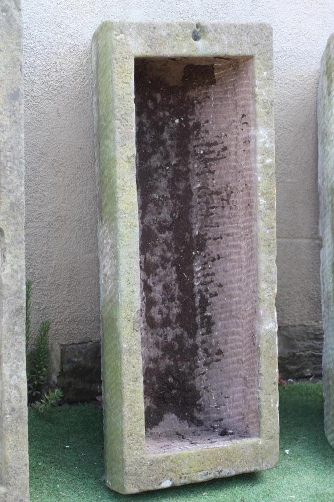 A LARGE SANDSTONE TROUGH of oblong tapering form, well cut, 127" w x 20" d x 12" h (Est. plus 24% Image