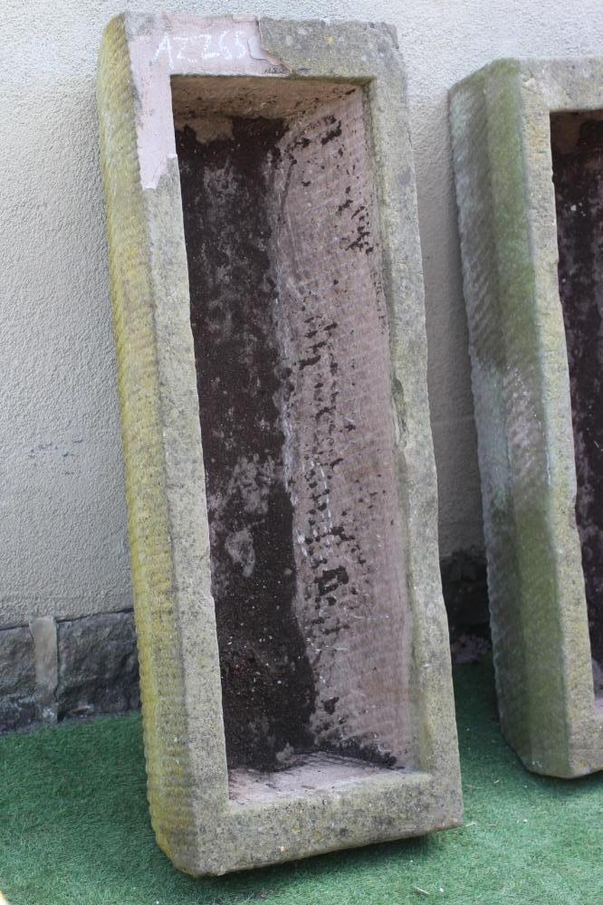 A LARGE SANDSTONE TROUGH of oblong tapering form, well cut, 127" w x 20" d x 12" h (Est. plus 24% Image