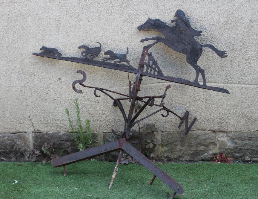 AN IRON WEATHERVANE, 20th century, the surmount depicting a fox hunting scene, 46" w x 46" h, with Image