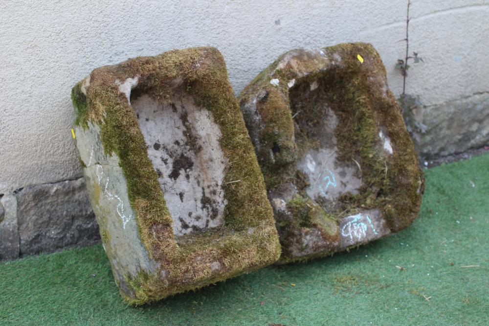 A SANDSTONE TROUGH of rough-hewn oblong form, 23" w x 16" d x 11" h, together with another similar, Image