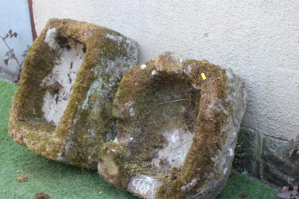 A SANDSTONE TROUGH of rough-hewn oblong form, 23" w x 16" d x 11" h, together with another similar, Image