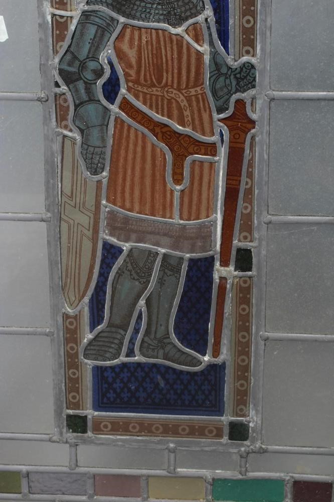A LEADED STAINED AND PAINTED GLASS PANEL Image
