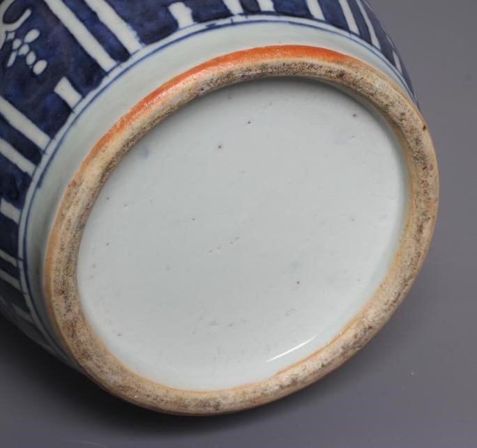 A CHINESE PORCELAIN JAR AND COVER of inverted baluster form painted in underglaze blue with two four Image