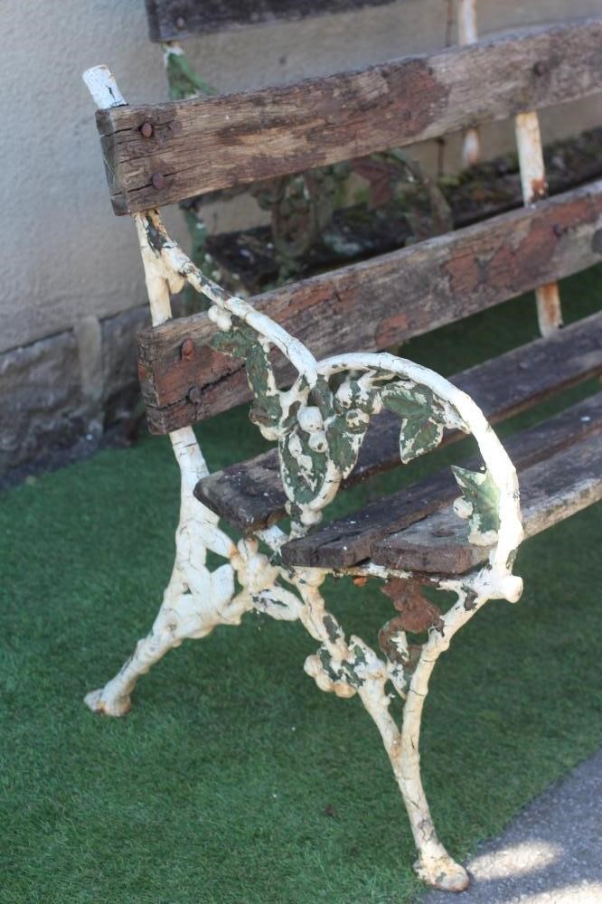 A PAIR OF VICTORIAN CAST IRON BENCHES Image