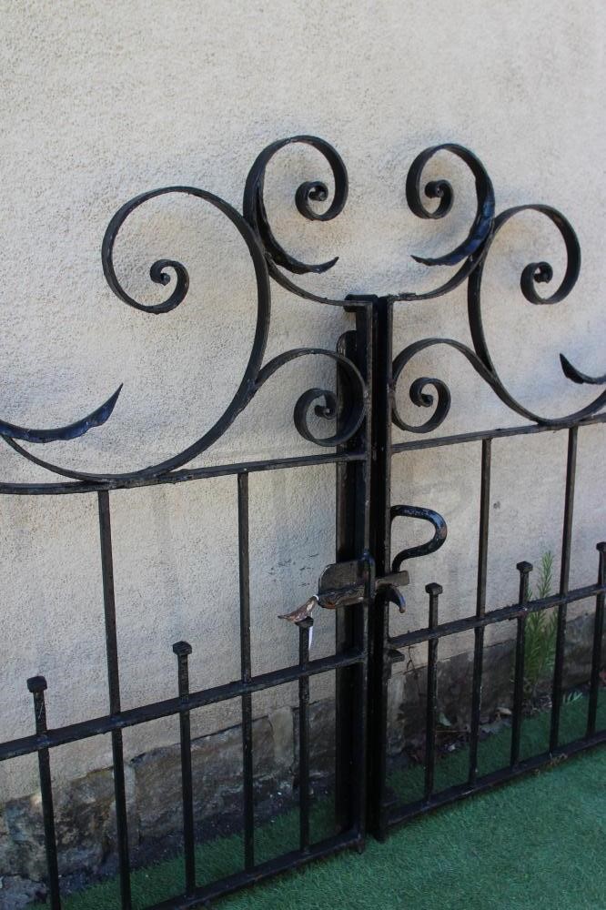 A PAIR OF IRONWORK ENTRANCE GATES Image