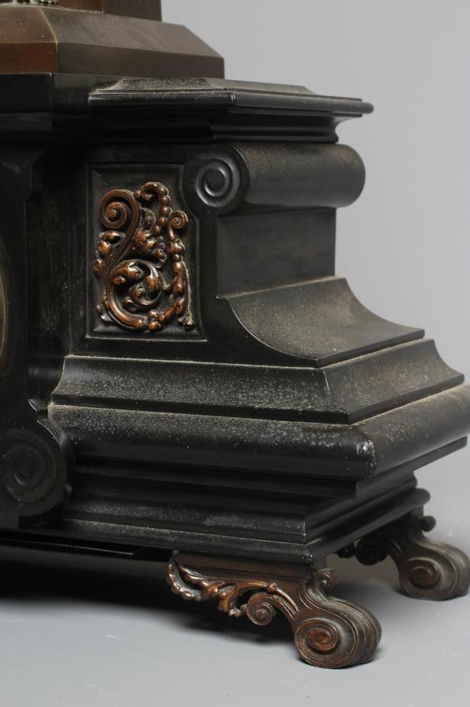 A FRENCH SLATE MANTEL CLOCK Image