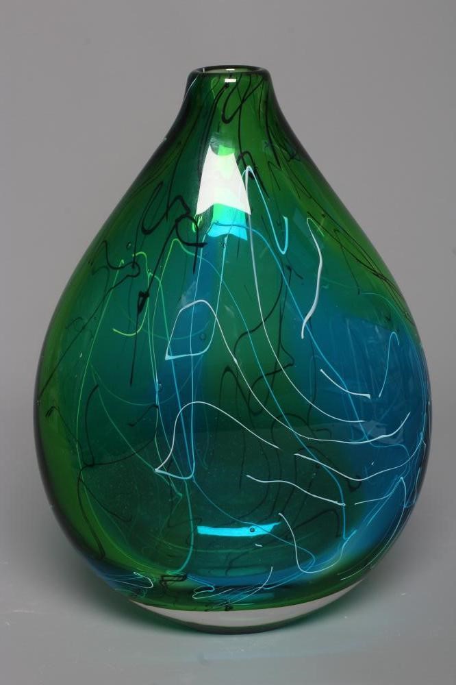 A STUART AKROYD GREEN LUDIC GLASS VASE of flattened oval form, signed, labelled, 9 1/2" high (Est. Image