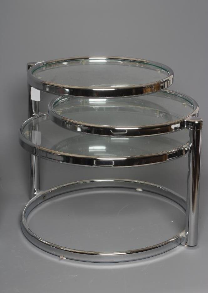 A PAIR OF LEITMOTIV DOUBLE SWIVEL SIDE TABLES, modern, the chromed steel frame supporting three Image
