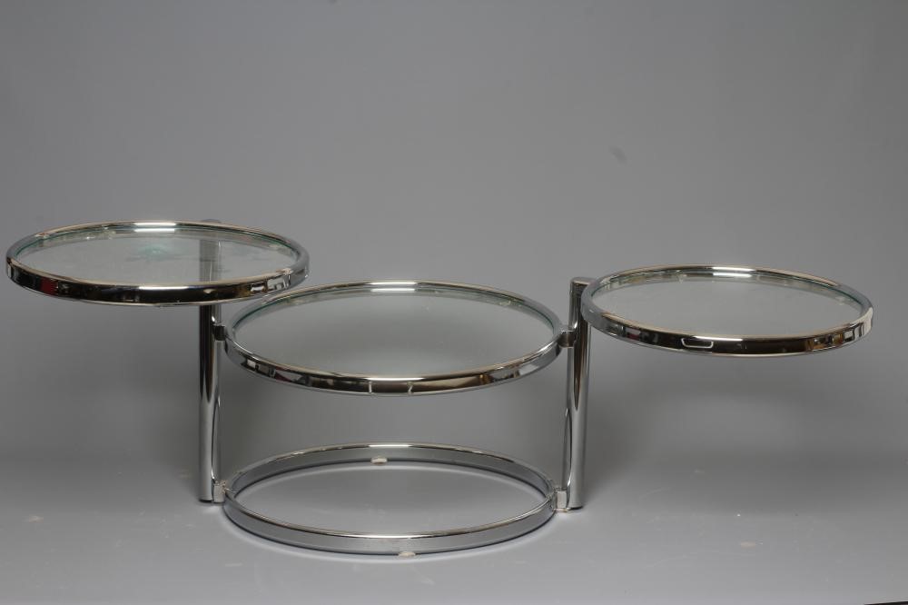 A PAIR OF LEITMOTIV DOUBLE SWIVEL SIDE TABLES, modern, the chromed steel frame supporting three Image