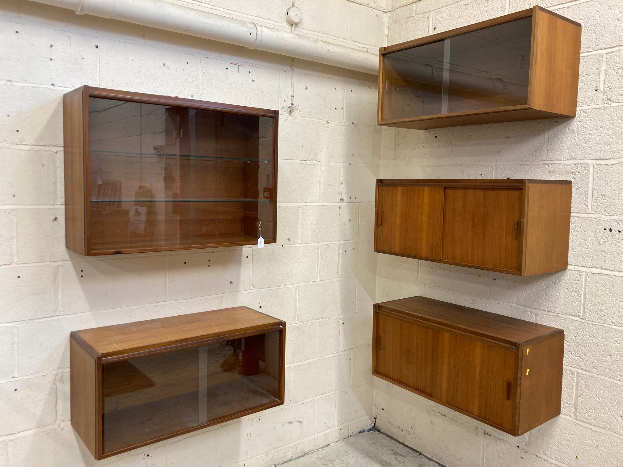 A TAPLEY S L MODULAR TEAK SET OF FLOATING CUPBOARDS Image