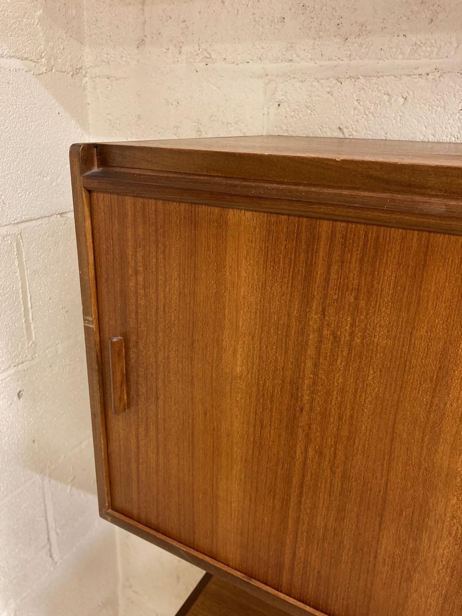 A TAPLEY S L MODULAR TEAK SET OF FLOATING CUPBOARDS Image