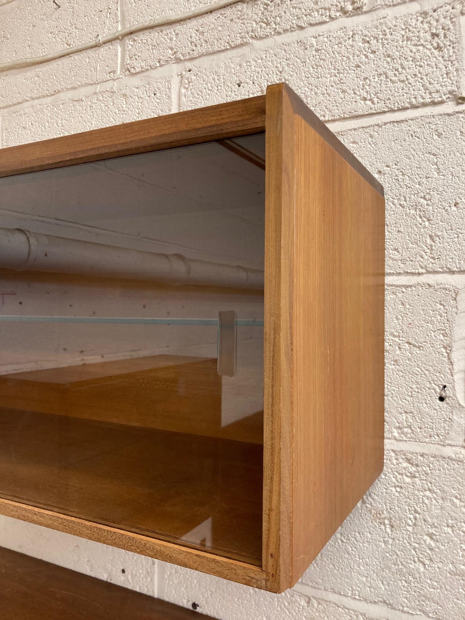 A TAPLEY S L MODULAR TEAK SET OF FLOATING CUPBOARDS Image