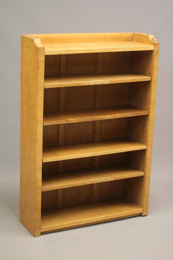 A ROBERT THOMPSON ADZED OAK OPEN BOOKCASE with galleried top and four adjustable shelves Image