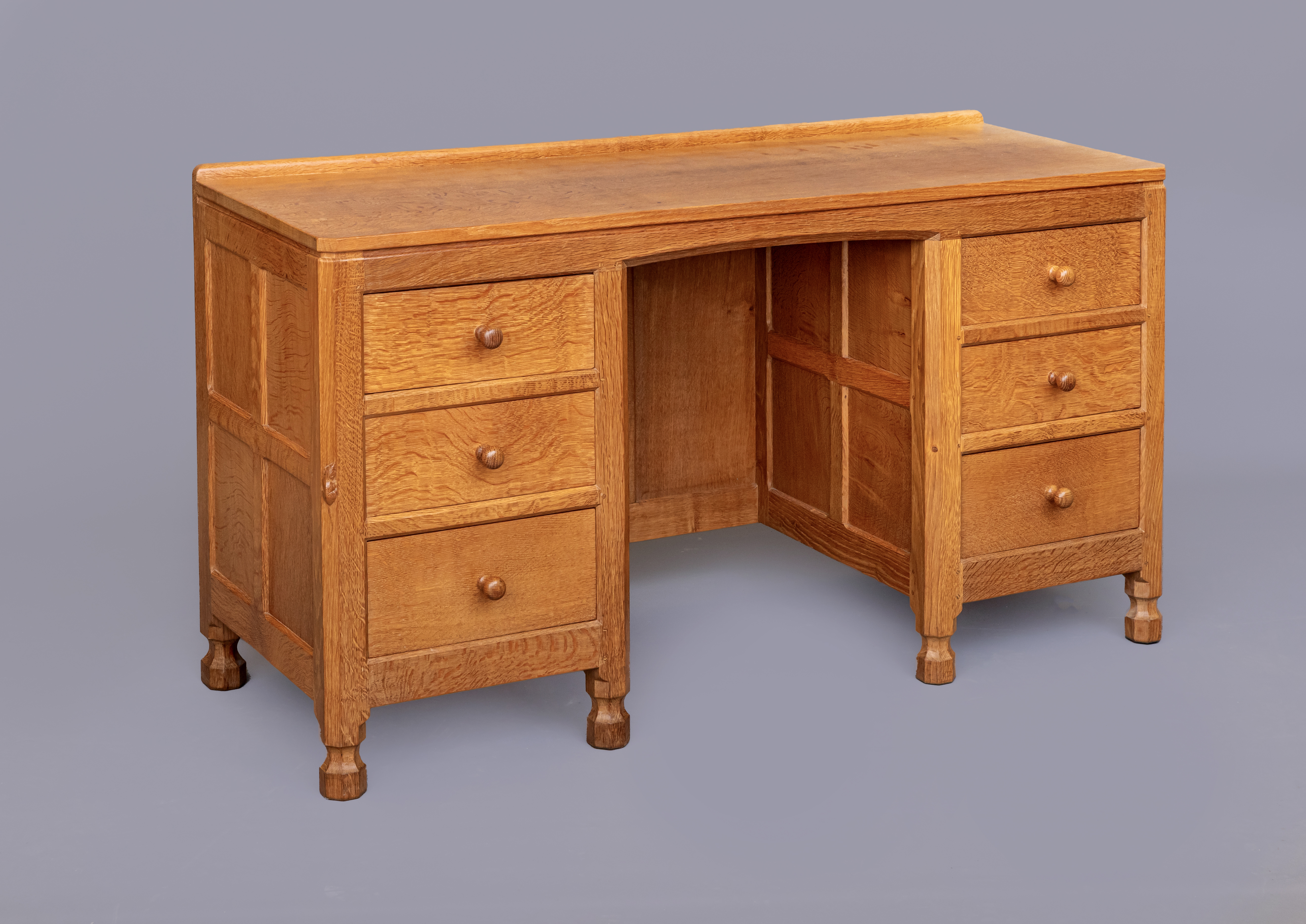 A ROBERT THOMPSON ADZED OAK PEDESTAL DESK Image