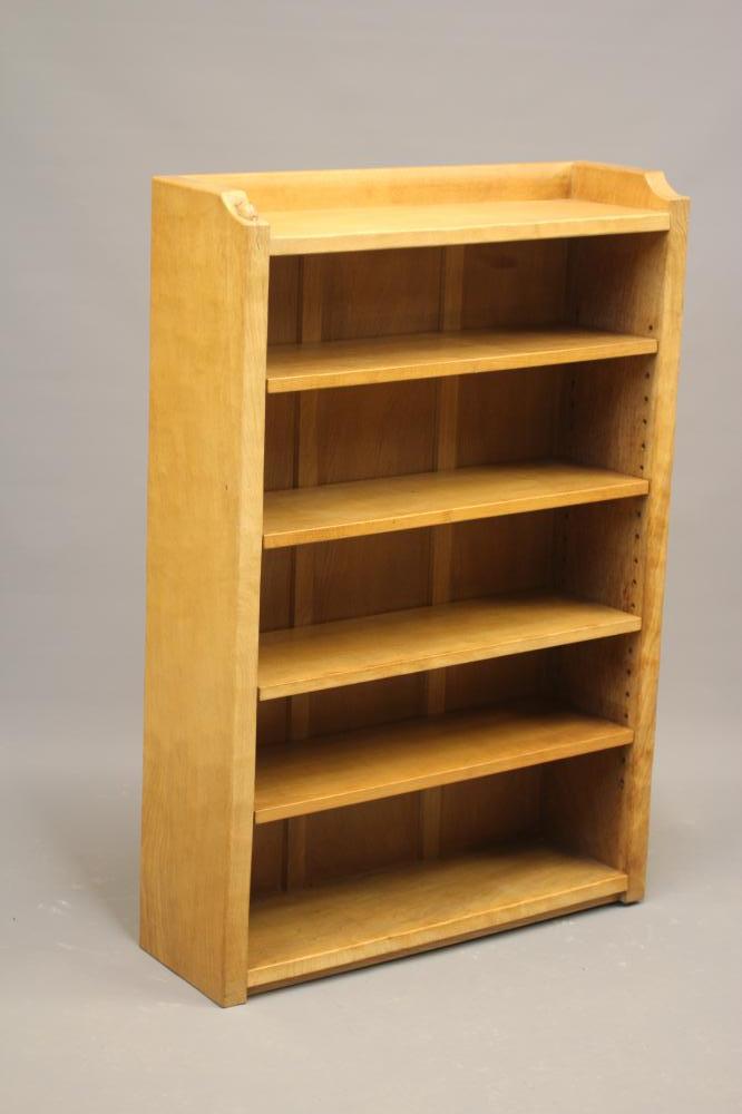 A ROBERT THOMPSON ADZED OAK OPEN BOOKCASE with galleried top and four adjustable shelves Image