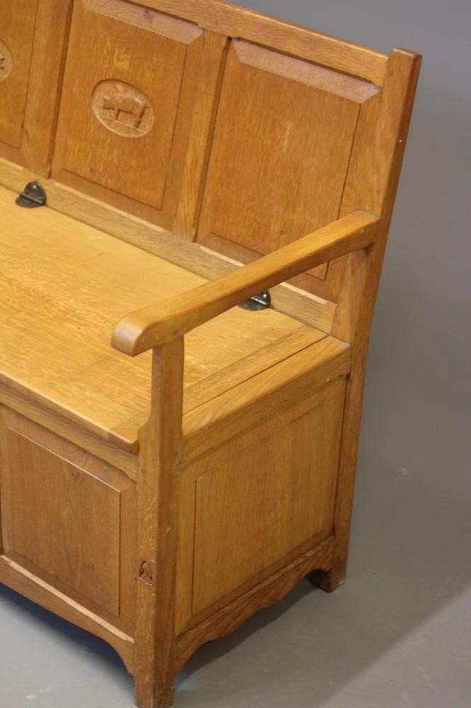 A KNIGHTMAN FAMILY OAK PANELLED BOX SETTLE Image