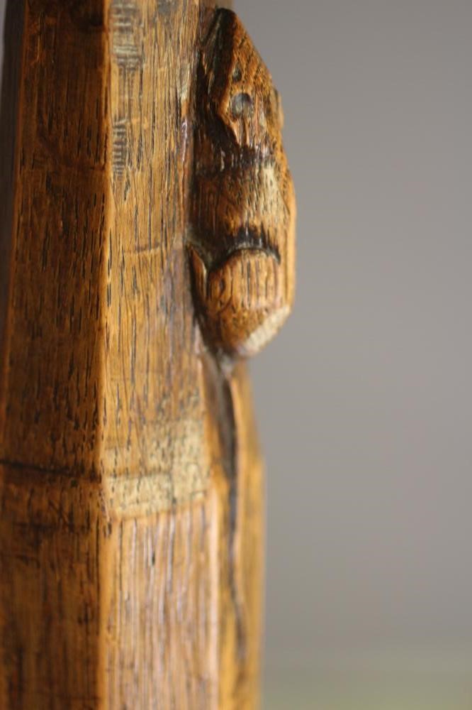 A ROBERT THOMPSON SET OF SEVEN ADZED OAK DINING CHAIRS Image