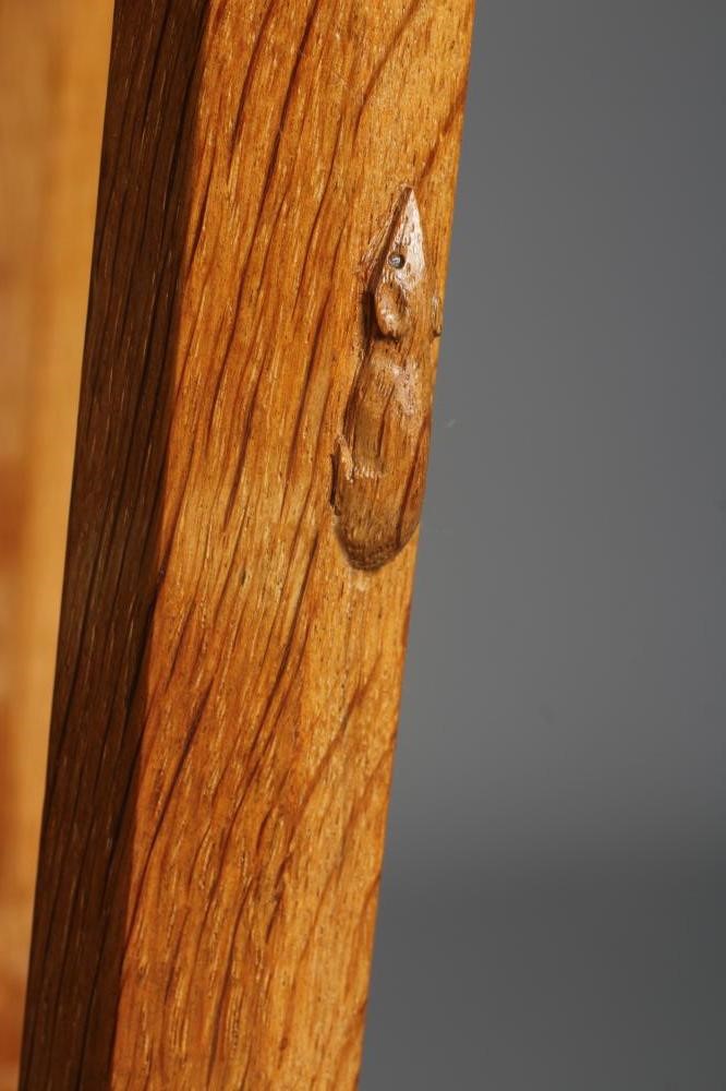 A ROBERT THOMPSON ADZED OAK NEST OF THREE TABLES Image