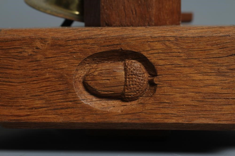 ACORN INDUSTRIES GEORGE GRAINGER - A PAIR OF OAK THREE LIGHT PENDANTS Image