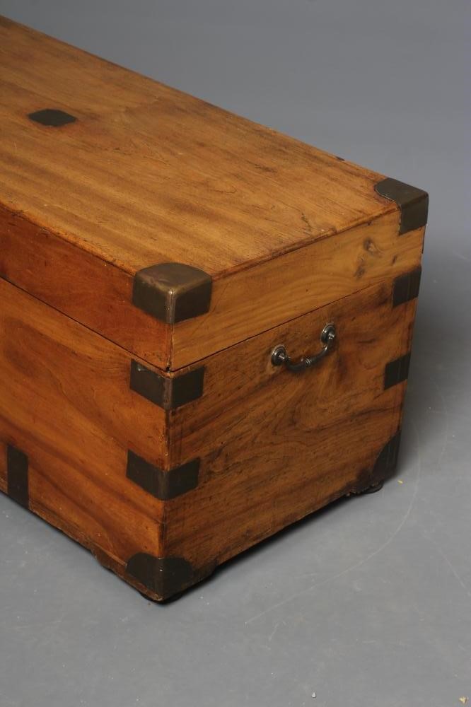 A CAMPHORWOOD AND BRASS MOUNTED CAMPAIGN STYLE TRAVEL CHEST Image