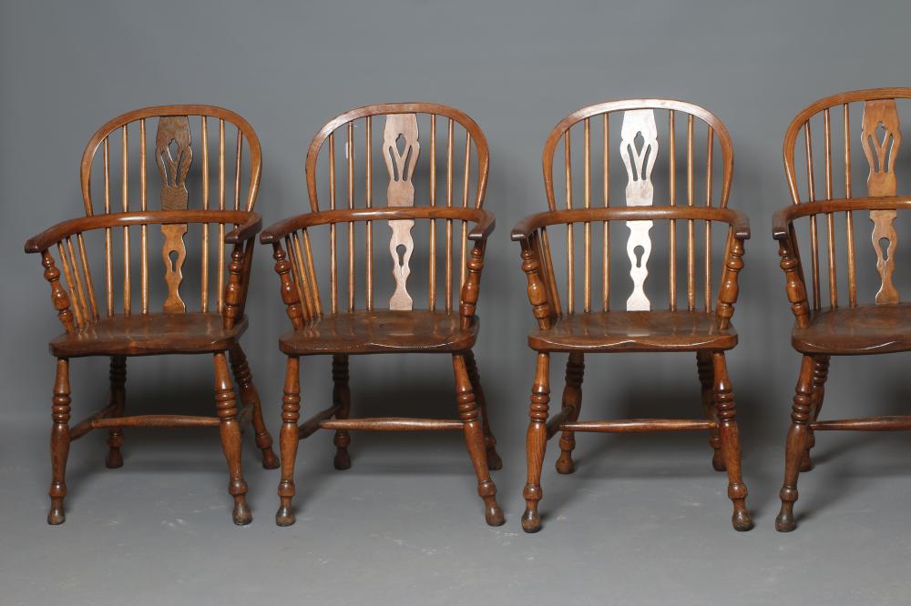 A SET OF TEN ASH AND ELM WINDSOR ARMCHAIRS Image
