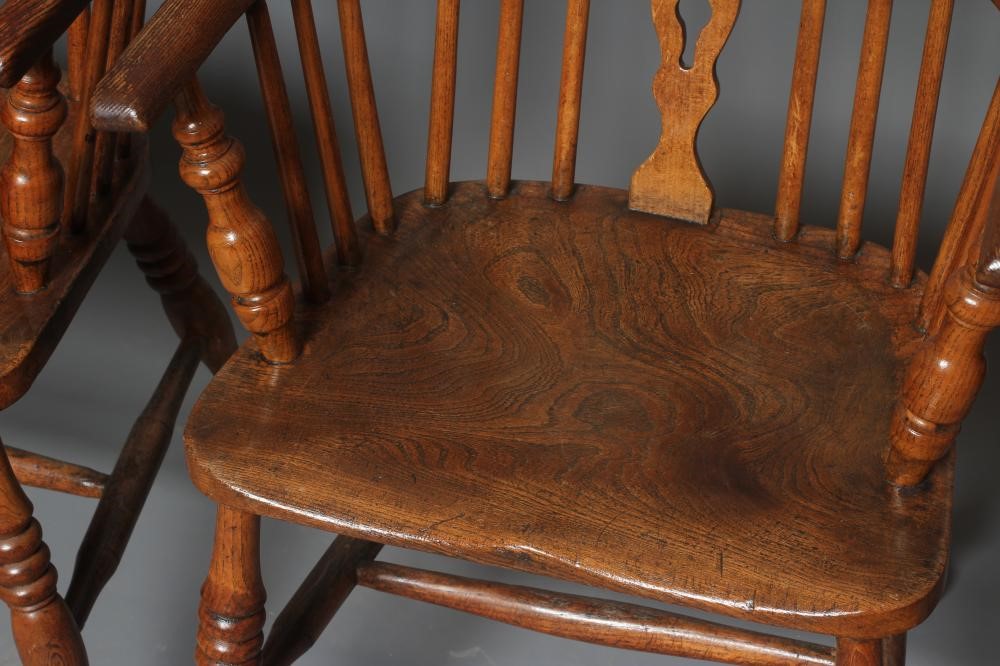 A SET OF TEN ASH AND ELM WINDSOR ARMCHAIRS Image