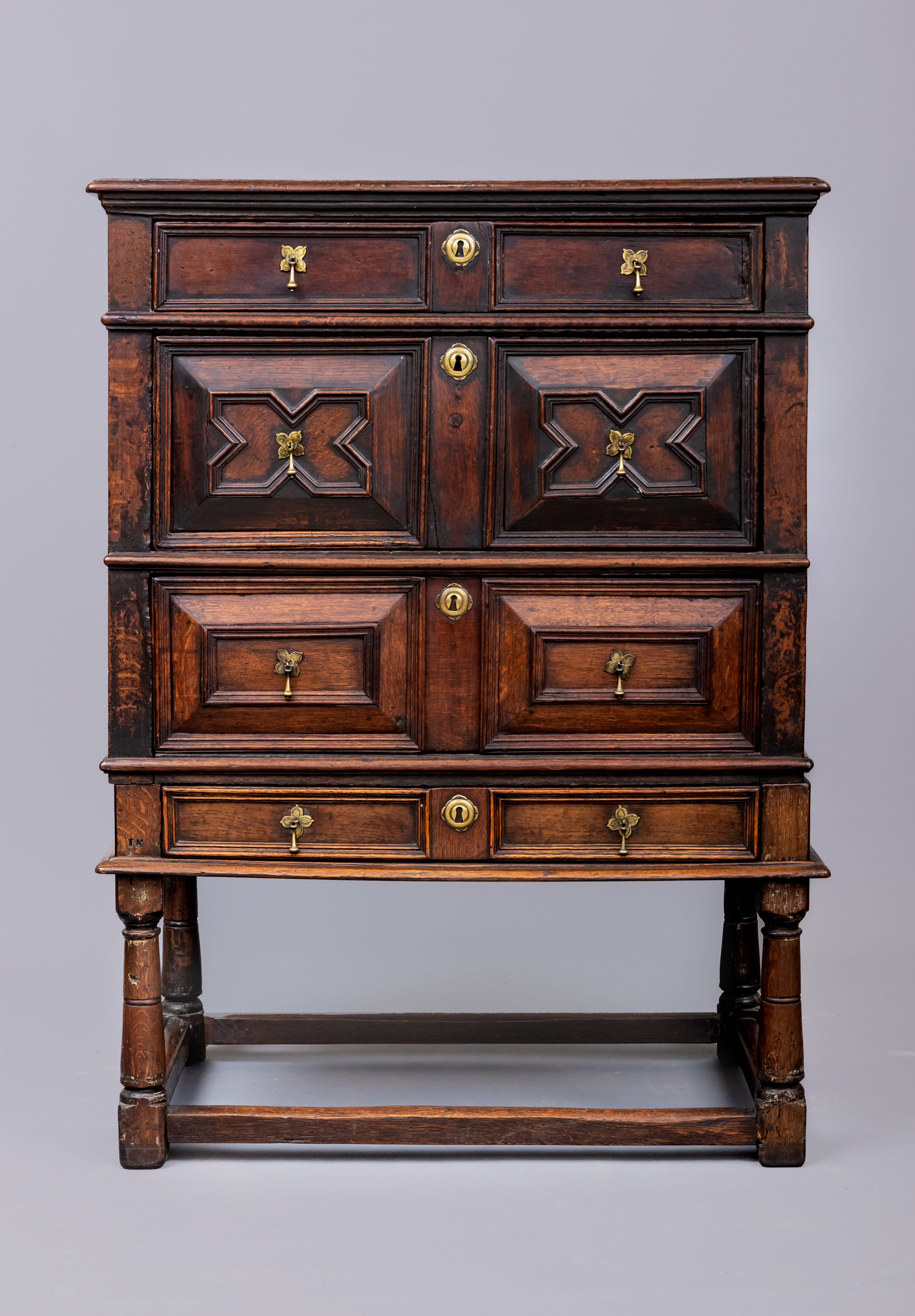 AN OAK GEOMETRICALLY MOULDED CHEST ON STAND c.1700 Image