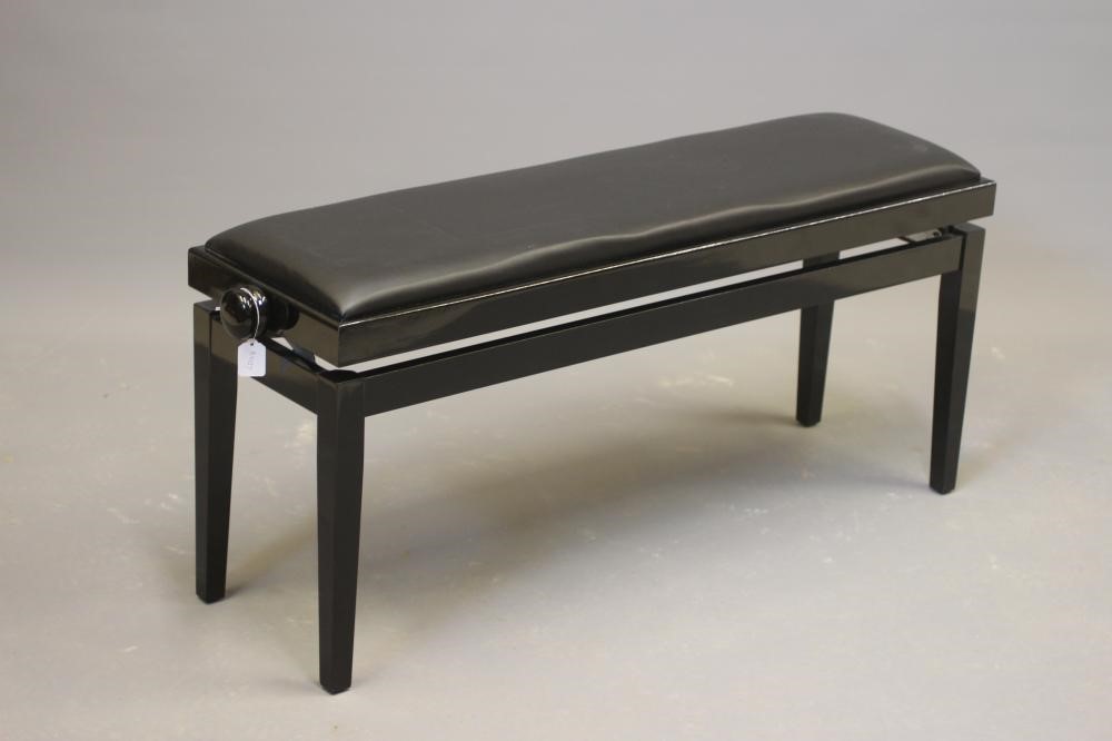 A YAMAHA "CLAVINOVA" ELECTRIC PIANO, modern, in upright ebonised case, 57 3/4" w x 18 3/4" d x 40" Image