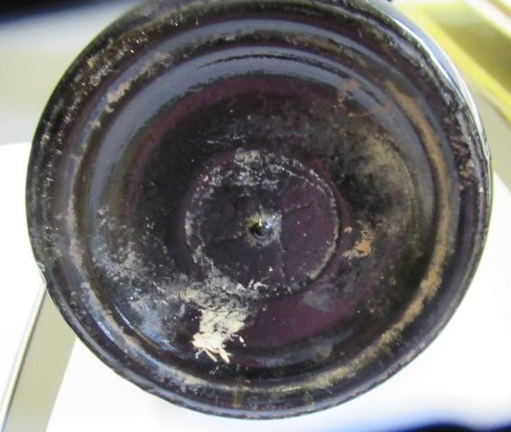 SEVEN GREEN GLASS BOTTLES including a wine bottle with a griffin seal Image