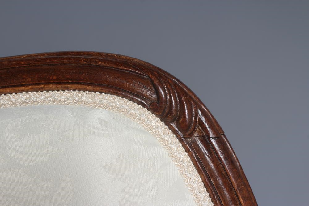 A STAINED BEECH ARMCHAIR Image